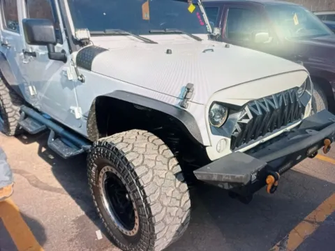 Another view of 2017 Jeep Wrangler Unlimited Sahara for sale in Plaistow, NH at CarFive Plaistow, NH