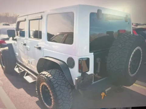 Photos of 2017 Jeep Wrangler Unlimited Sahara for sale in Plaistow, NH at CarFive Plaistow, NH