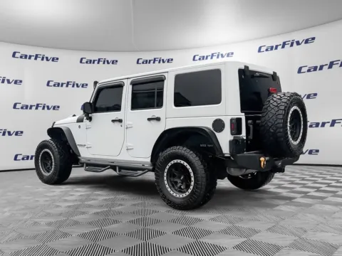 Another view of 2017 Jeep Wrangler Unlimited Sahara for sale in Plaistow, NH at CarFive Plaistow, NH