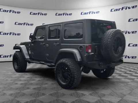 Another view of 2017 Jeep Wrangler Unlimited Sahara for sale in Plaistow, NH at CarFive Plaistow, NH