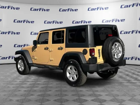 Another view of 2014 Jeep Wrangler Unlimited Sport for sale in Plaistow, NH at CarFive Plaistow, NH