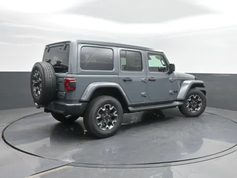 Gray 2026 Jeep Wrangler Sahara for sale in Charles City, IA