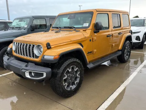 Gold 2026 Jeep Wrangler Sahara for sale in Charles City, IA