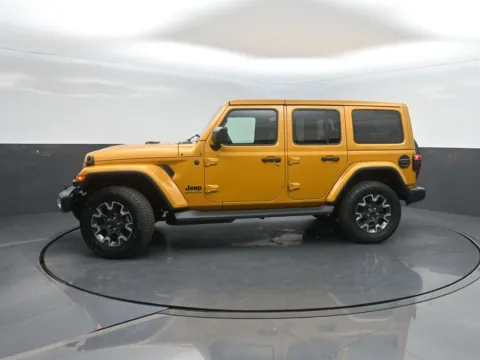 Gold 2026 Jeep Wrangler Sahara for sale in Charles City, IA