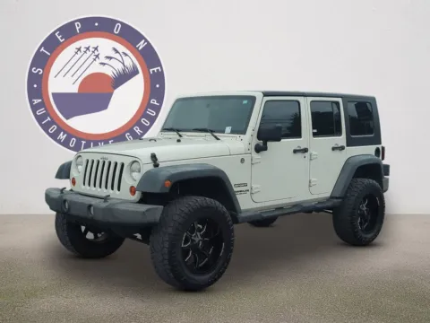 Photos of 2010 Jeep Wrangler Unlimited Sport for sale in Fort Walton Beach, FL at Step One Cadillac Fort Walton Beach
