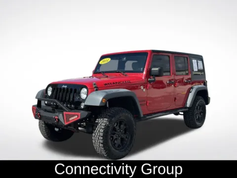 Photos of 2014 Jeep Wrangler Unlimited Sport for sale in Pensacola, FL at Step One Cadillac Pensacola