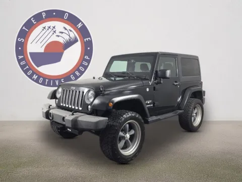 Black 2016 Jeep Wrangler Sahara for sale in Fort Walton Beach, FL