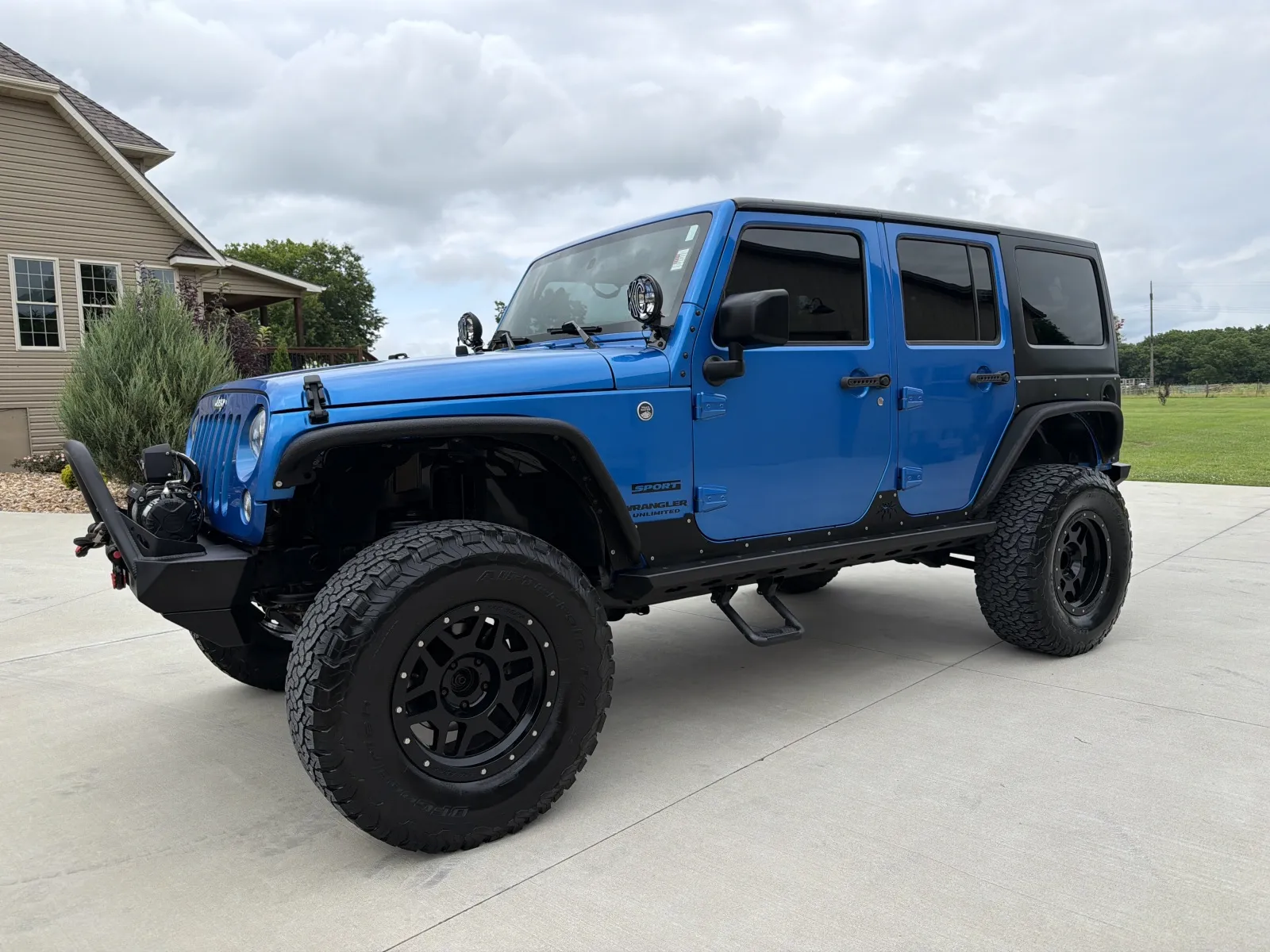 Blue 2016 Jeep Wrangler Unlimited Sport S Sport Utility 4D for sale in Clinton, MO
