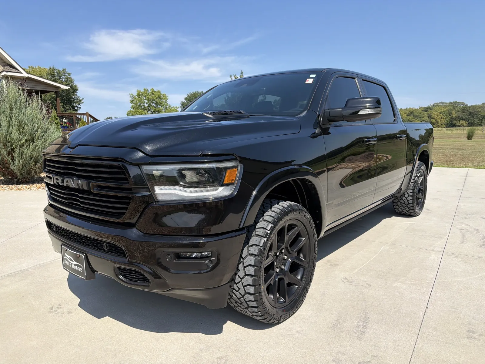 Black 2022 Ram 1500 Crew Cab Laramie Pickup 4D 5 1/2 ft for sale in Clinton, MO