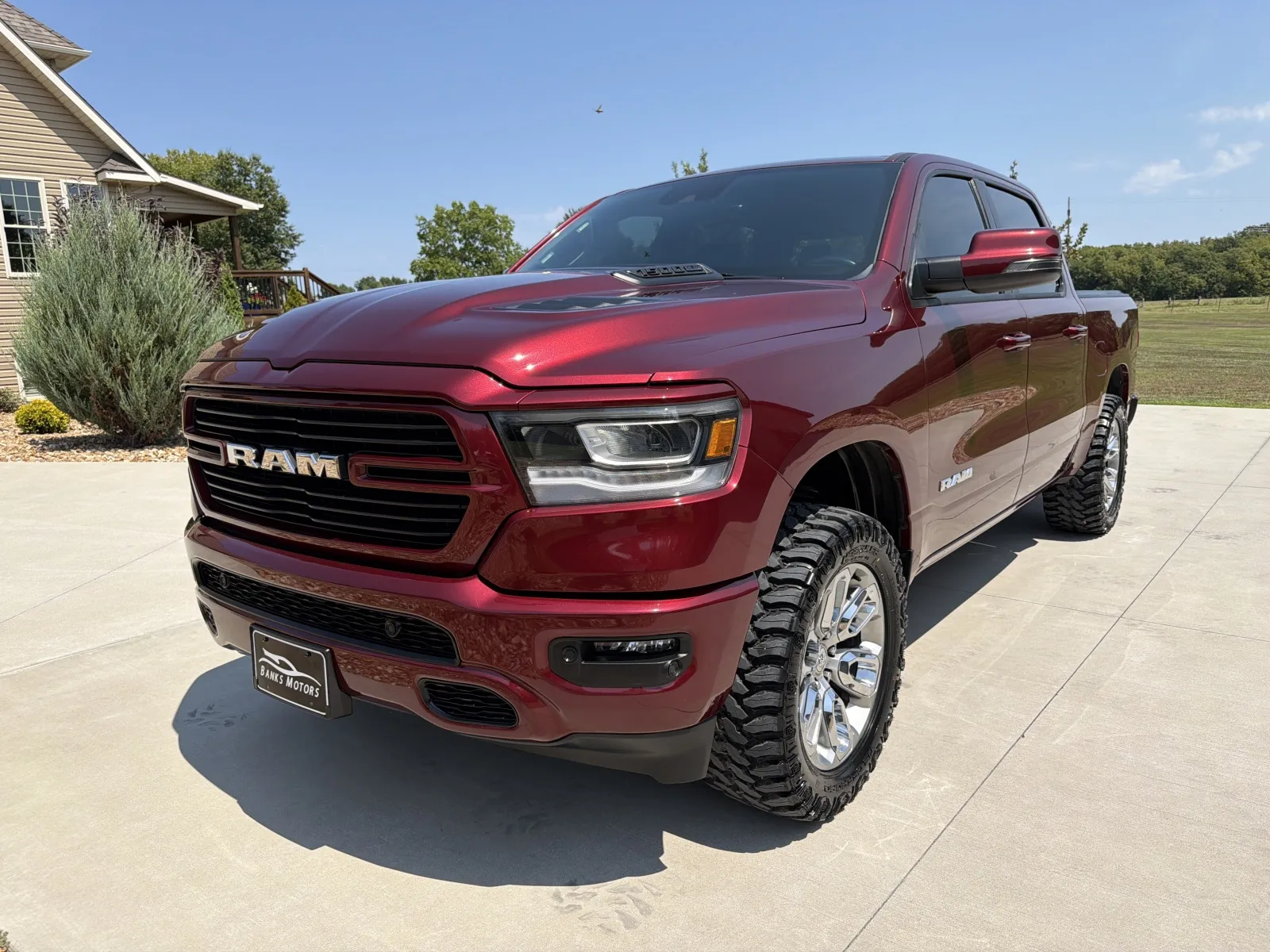 Red 2023 Ram 1500 Crew Cab Laramie Pickup 4D 5 1/2 ft for sale in Clinton, MO