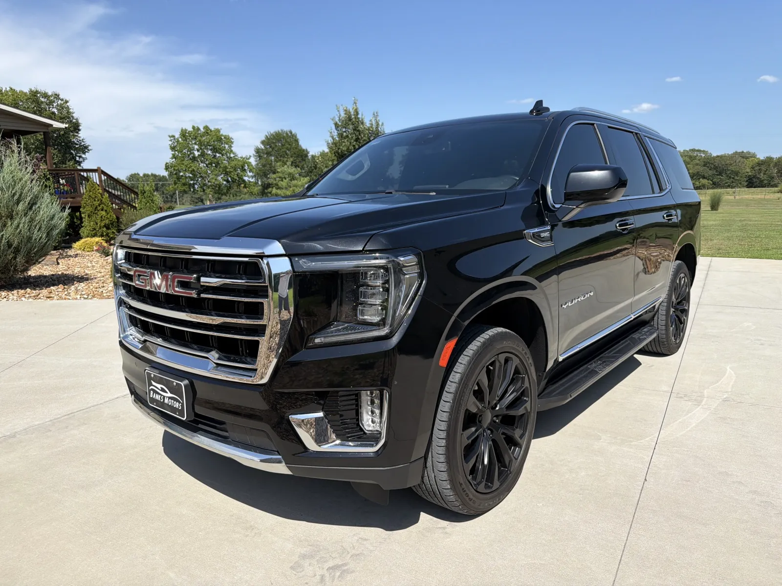 Photos of 2023 GMC Yukon SLT Sport Utility 4D for sale in Clinton, MO at Banks Motors LLC