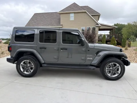 Photos of 2019 Jeep Wrangler Unlimited Sahara Sport Utility 4D for sale in Clinton, MO at Banks Motors LLC