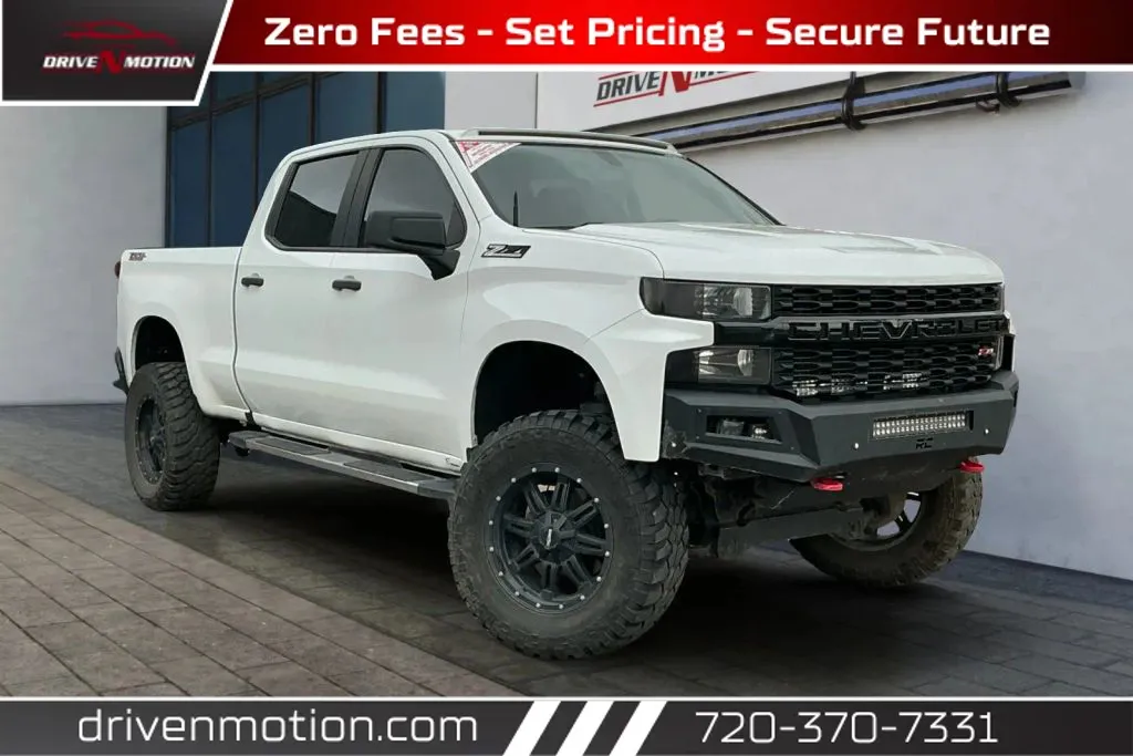 White 2021 Chevrolet Silverado 1500 Crew Cab Custom Trail Boss Pickup 4D 6 1/2 ft for sale in Thornton, CO
