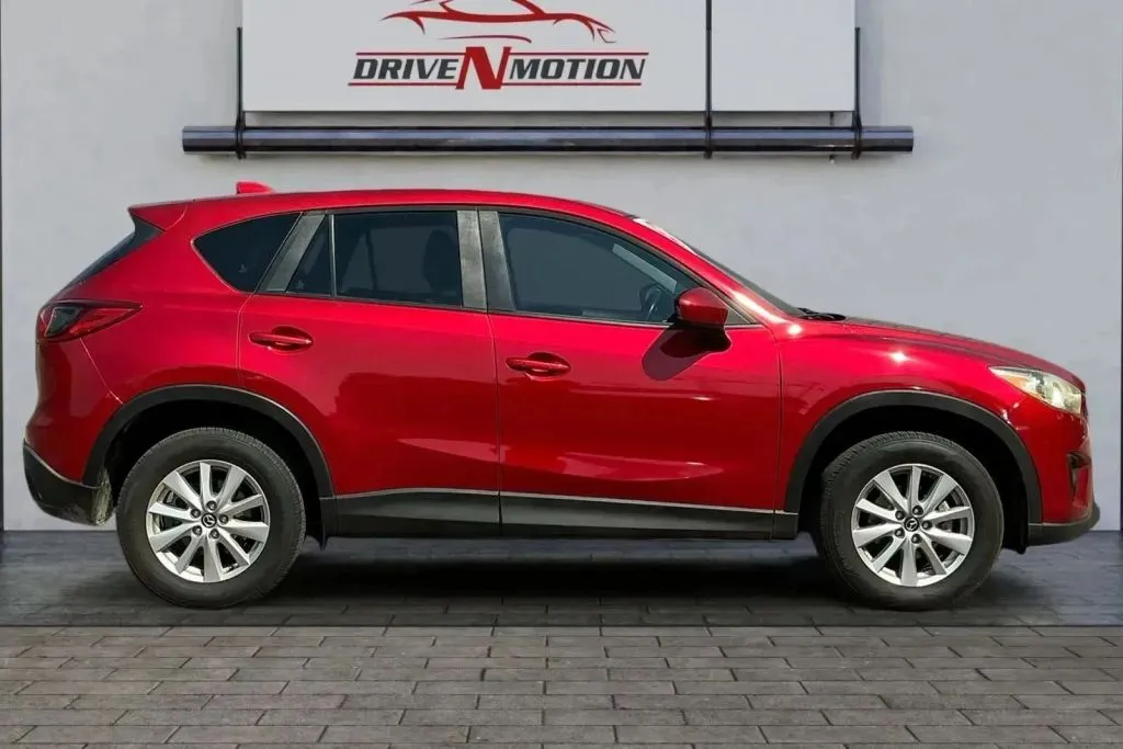 Another view of 2015 MAZDA CX-5 Touring Sport Utility 4D for sale in Thornton, CO at Drive N-Motion Thornton