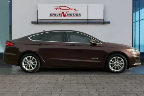 Another view of 2019 Ford Fusion SEL Hybrid Sedan 4D for sale in Thornton, CO at Drive N-Motion Thornton