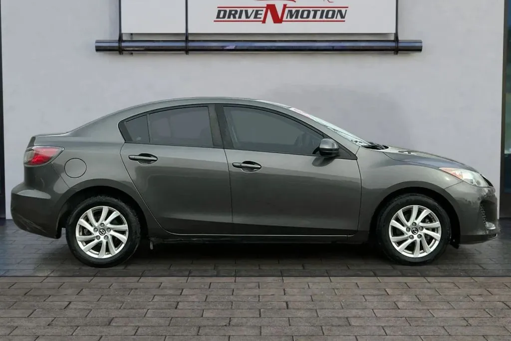 Another view of 2013 MAZDA MAZDA3 i Touring Sedan 4D for sale in Thornton, CO at Drive N-Motion Thornton