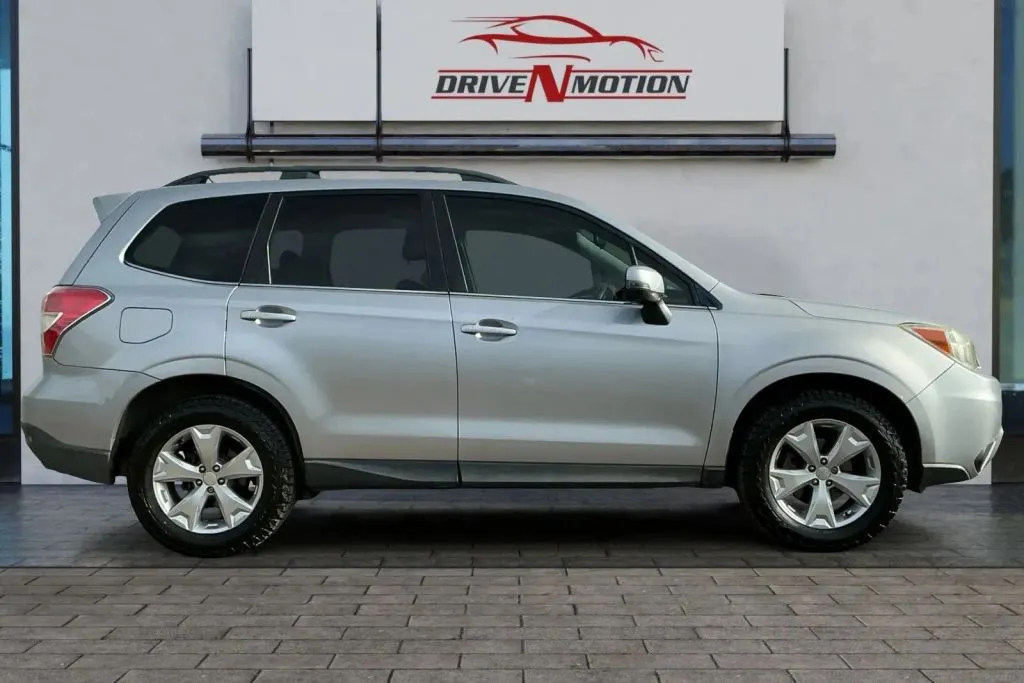 Photos of 2014 Subaru Forester 2.5i Touring Sport Utility 4D for sale in Thornton, CO at Drive N-Motion Thornton
