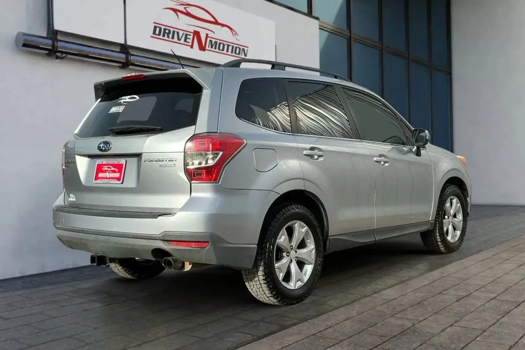 Another view of 2014 Subaru Forester 2.5i Touring Sport Utility 4D for sale in Thornton, CO at Drive N-Motion Thornton