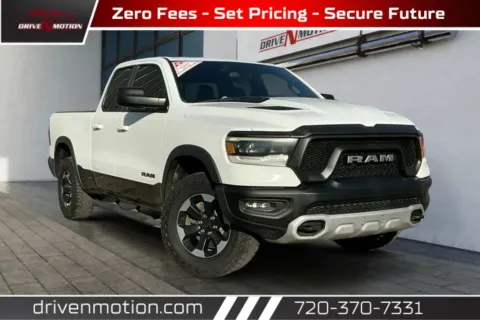 White 2019 Ram 1500 Quad Cab Rebel Pickup 4D 6 1/3 ft for sale in Thornton, CO