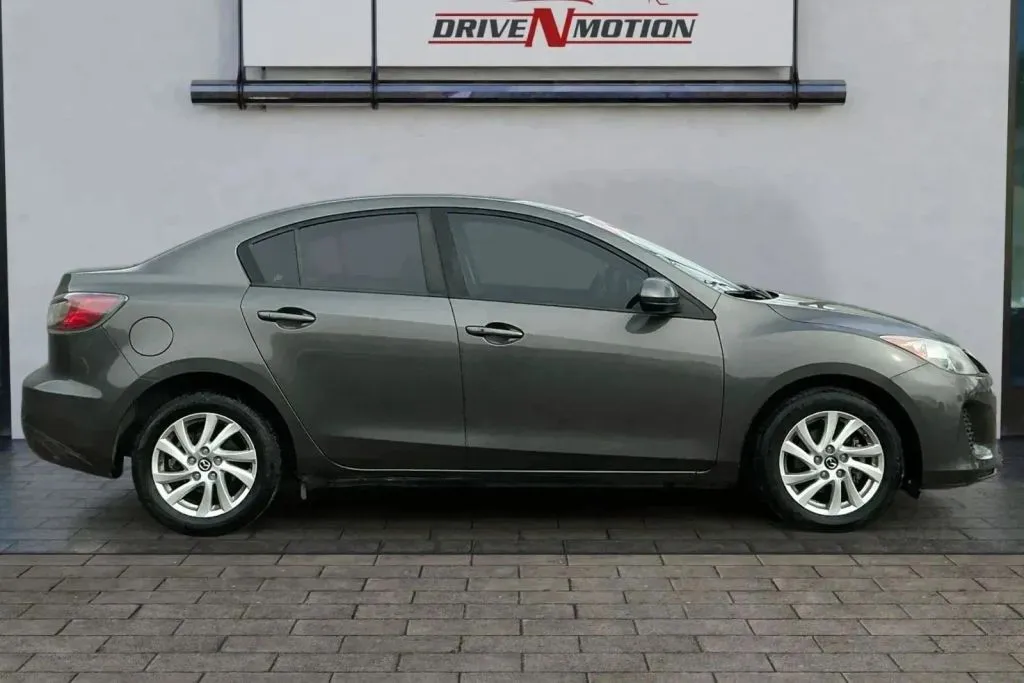 Another view of 2013 MAZDA MAZDA3 i Touring Sedan 4D for sale in Thornton, CO at Drive N-Motion Thornton