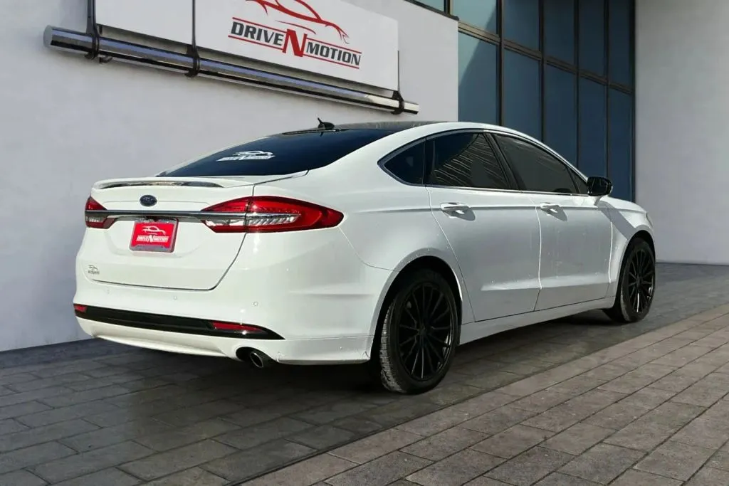 Another view of 2017 Ford Fusion Titanium Hybrid Sedan 4D for sale in Thornton, CO at Drive N-Motion Thornton