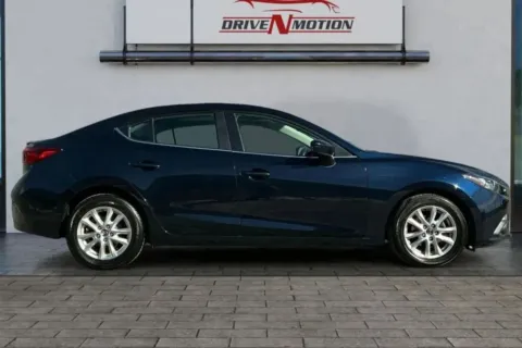 Another view of 2015 MAZDA MAZDA3 i Touring Sedan 4D for sale in Thornton, CO at Drive N-Motion Thornton