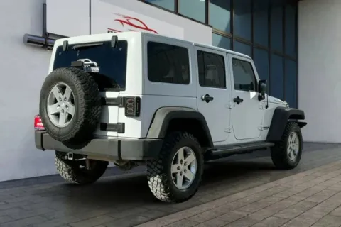 Another view of 2012 Jeep Wrangler Unlimited Rubicon Sport Utility 4D for sale in Thornton, CO at Drive N-Motion Thornton