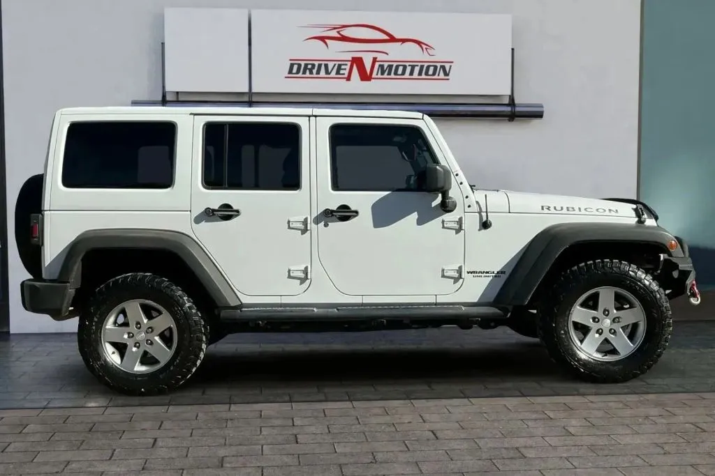 Photos of 2012 Jeep Wrangler Unlimited Rubicon Sport Utility 4D for sale in Thornton, CO at Drive N-Motion Thornton