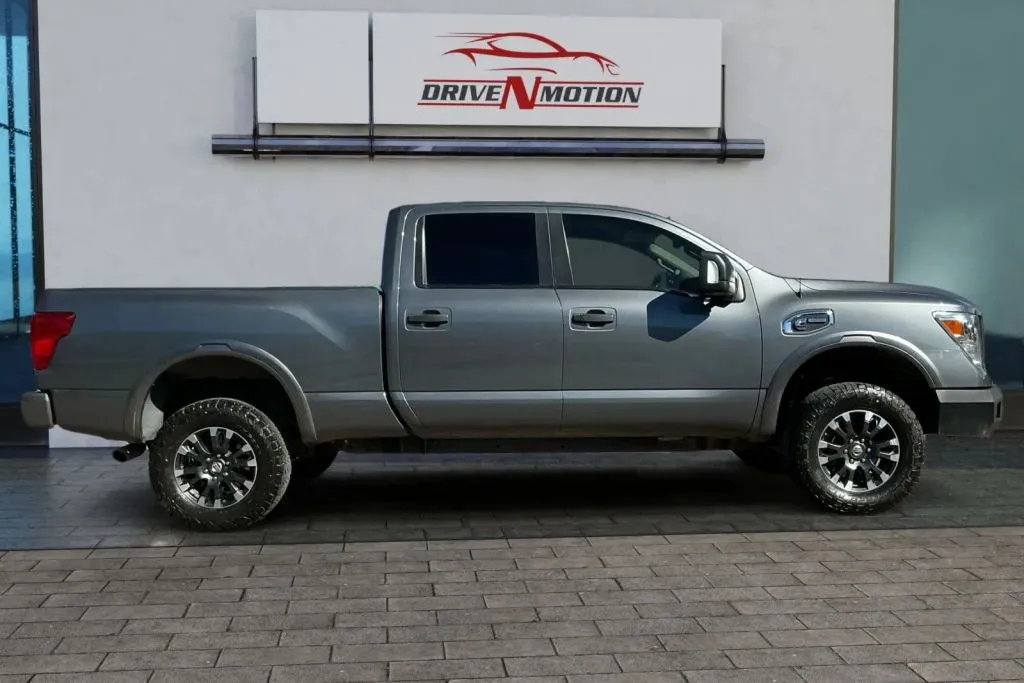 Another view of 2019 Nissan TITAN XD Crew Cab PRO-4X Pickup 4D 6 1/2 ft for sale in Thornton, CO at Drive N-Motion Thornton