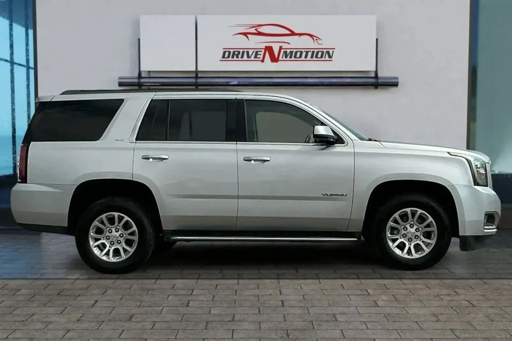 Another view of 2019 GMC Yukon SLT Sport Utility 4D for sale in Thornton, CO at Drive N-Motion Thornton