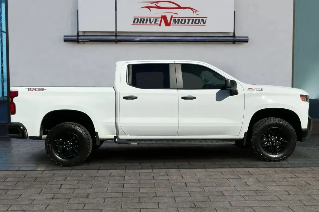 Another view of 2021 Chevrolet Silverado 1500 Crew Cab Custom Trail Boss Pickup 4D 5 3/4 ft for sale in Thornton, CO at Drive N-Motion Thornton