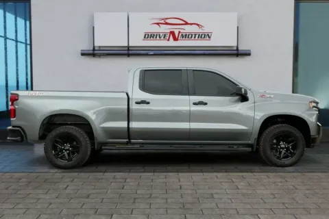 Another view of 2021 Chevrolet Silverado 1500 Crew Cab LT Trail Boss Pickup 4D 6 1/2 ft for sale in Thornton, CO at Drive N-Motion Thornton