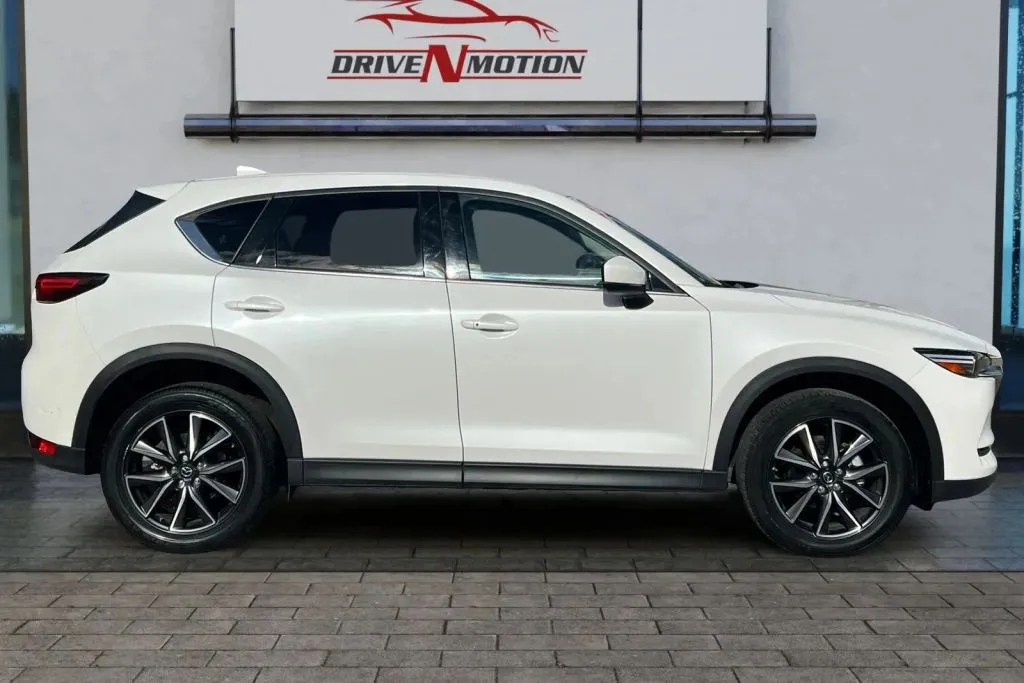 Another view of 2018 MAZDA CX-5 Grand Touring Sport Utility 4D for sale in Thornton, CO at Drive N-Motion Thornton