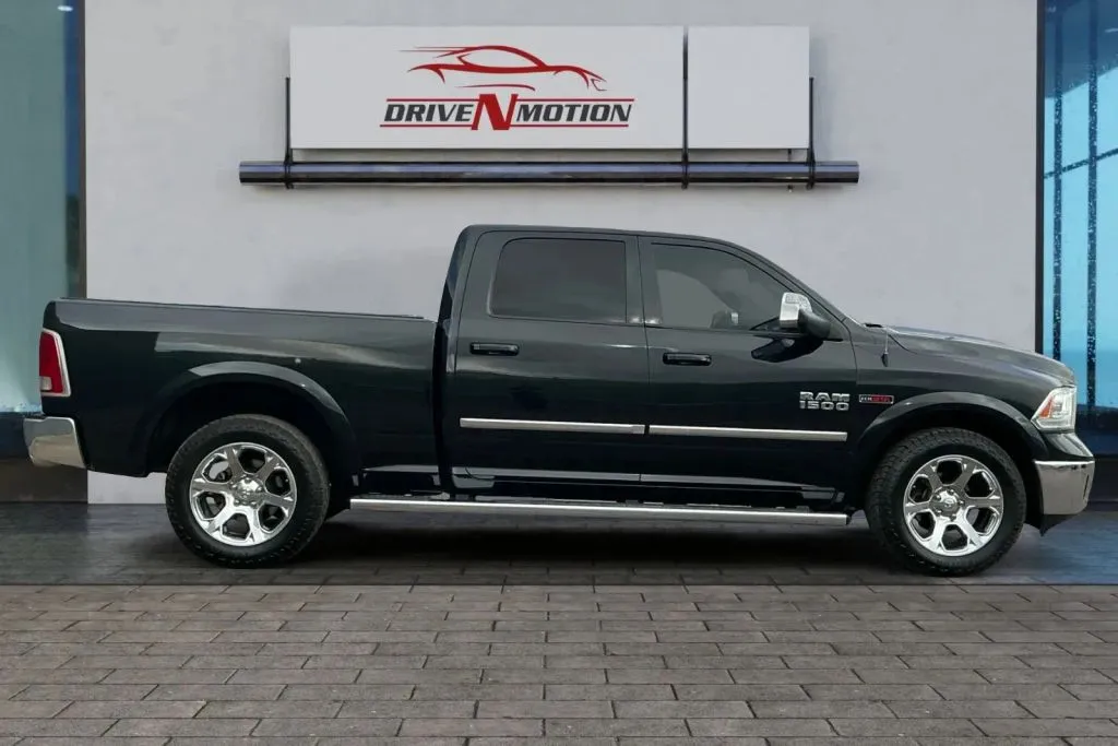 Another view of 2018 Ram 1500 Crew Cab Laramie Pickup 4D 6 1/3 ft for sale in Thornton, CO at Drive N-Motion Thornton