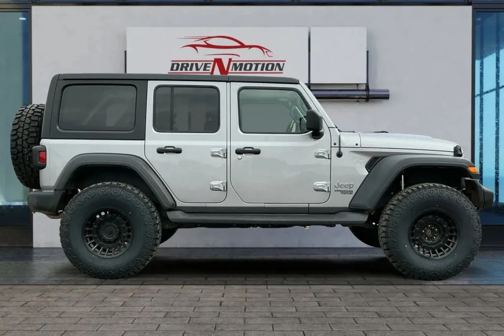 Another view of 2020 Jeep Wrangler Unlimited Sport S Sport Utility 4D for sale in Thornton, CO at Drive N-Motion Thornton