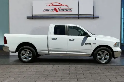 Another view of 2015 Ram 1500 Quad Cab Big Horn Pickup 4D 6 1/3 ft for sale in Thornton, CO at Drive N-Motion Thornton