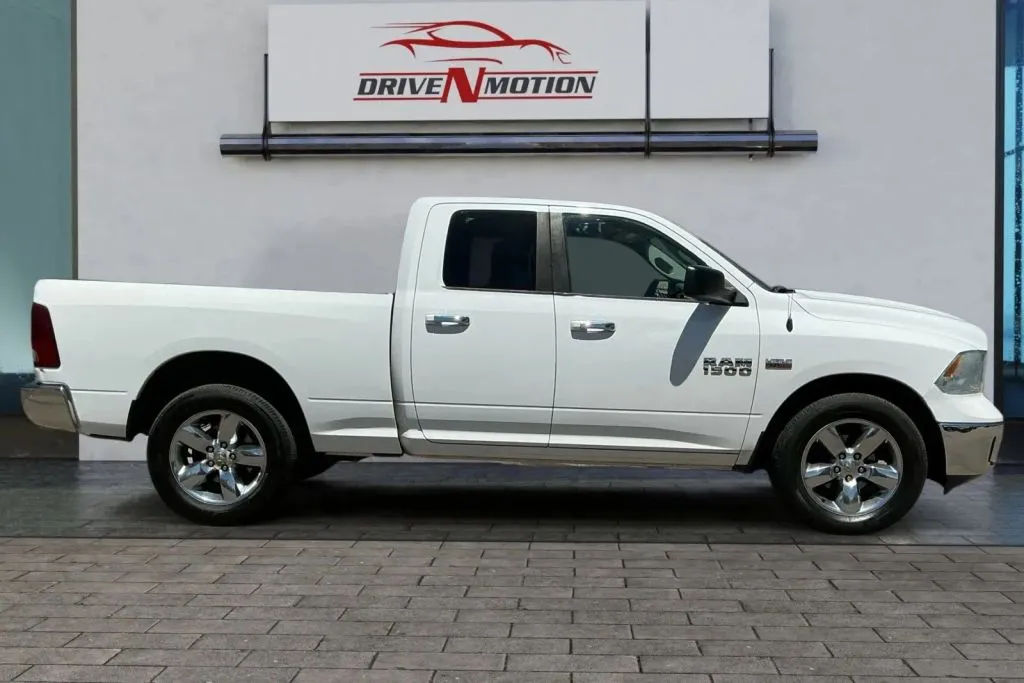 Another view of 2015 Ram 1500 Quad Cab Big Horn Pickup 4D 6 1/3 ft for sale in Thornton, CO at Drive N-Motion Thornton