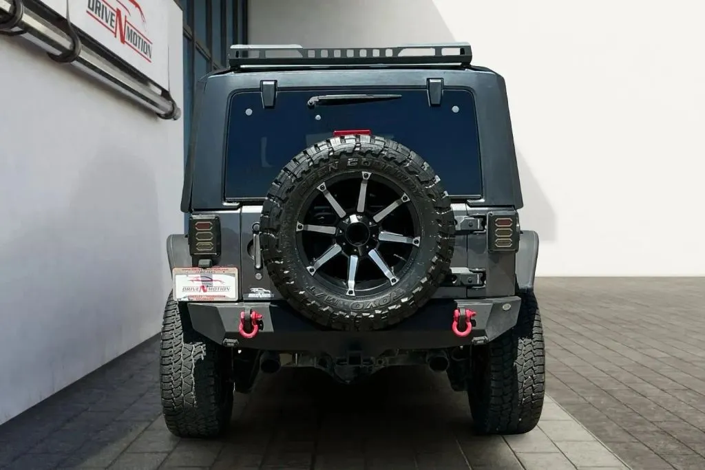More photos of 2014 Jeep Wrangler Unlimited Sport SUV 4D at Drive N-Motion Thornton, CO