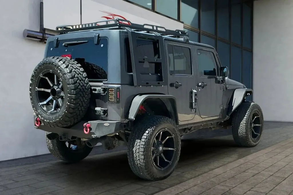 More photos of 2014 Jeep Wrangler Unlimited Sport SUV 4D at Drive N-Motion Thornton, CO