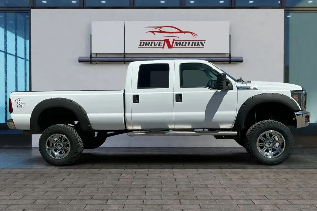 Another view of 2012 Ford F350 Super Duty Crew Cab XLT Pickup 4D 8 ft for sale in Thornton, CO at Drive N-Motion Thornton