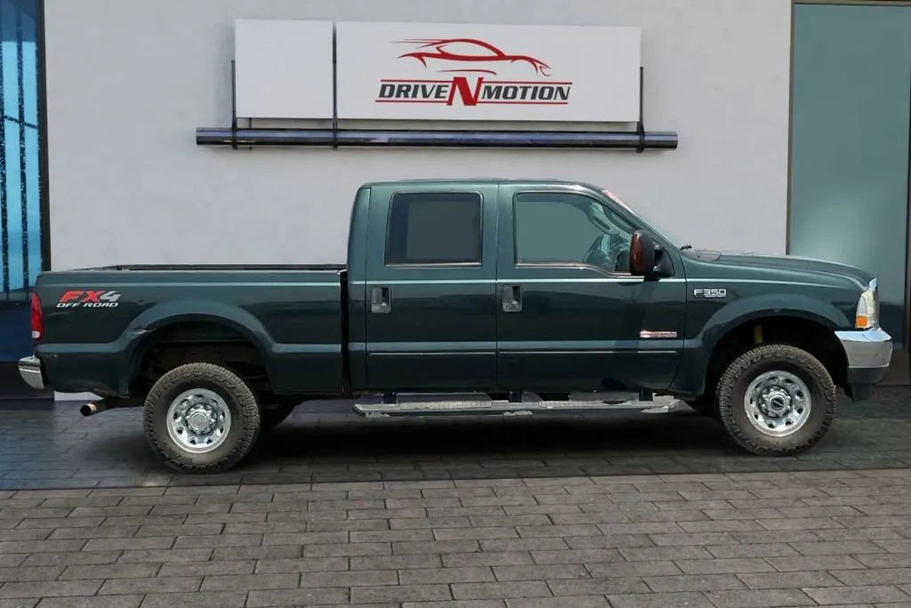 Another view of 2004 Ford F350 Super Duty Crew Cab XL Pickup 4D 6 3/4 ft for sale in Thornton, CO at Drive N-Motion Thornton