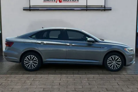 Another view of 2019 Volkswagen Jetta 1.4T SEL Sedan 4D for sale in Thornton, CO at Drive N-Motion Thornton