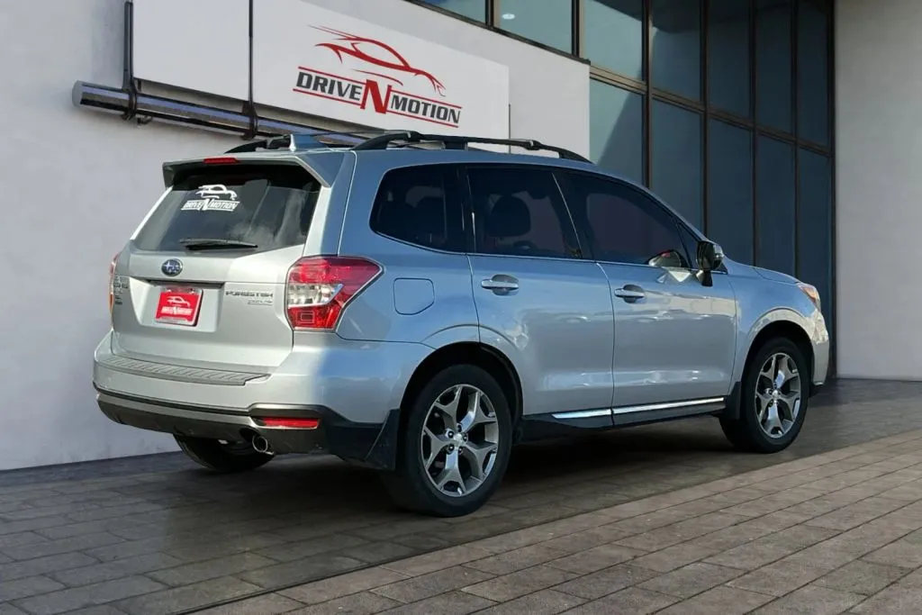 Photos of 2016 Subaru Forester 2.5i Touring Sport Utility 4D for sale in Thornton, CO at Drive N-Motion Thornton