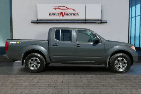 Another view of 2014 Nissan Frontier Crew Cab PRO-4X Pickup 4D 5 ft for sale in Thornton, CO at Drive N-Motion Thornton