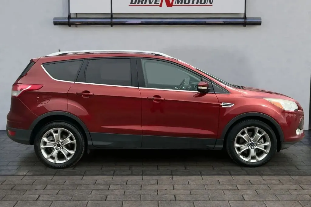 Another view of 2015 Ford Escape Titanium Sport Utility 4D for sale in Thornton, CO at Drive N-Motion Thornton
