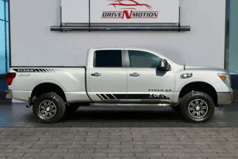Another view of 2017 Nissan TITAN XD Crew Cab SV Pickup 4D 6 1/2 ft for sale in Thornton, CO at Drive N-Motion Thornton