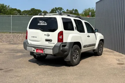 Another view of 2015 Nissan Xterra PRO-4X Sport Utility 4D for sale in Thornton, CO at Drive N-Motion Thornton