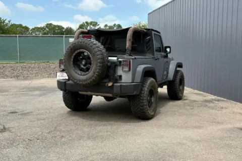 Another view of 2013 Jeep Wrangler Sport SUV 2D for sale in Thornton, CO at Drive N-Motion Thornton