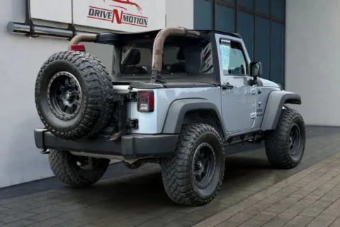 Photos of 2013 Jeep Wrangler Sport SUV 2D for sale in Thornton, CO at Drive N-Motion Thornton