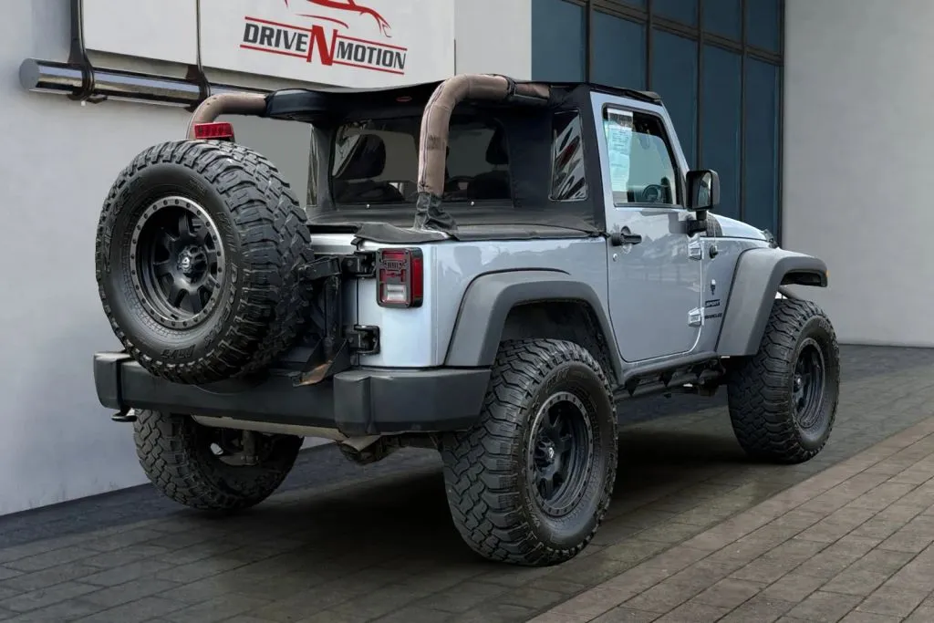 Photos of 2013 Jeep Wrangler Sport SUV 2D for sale in Thornton, CO at Drive N-Motion Thornton